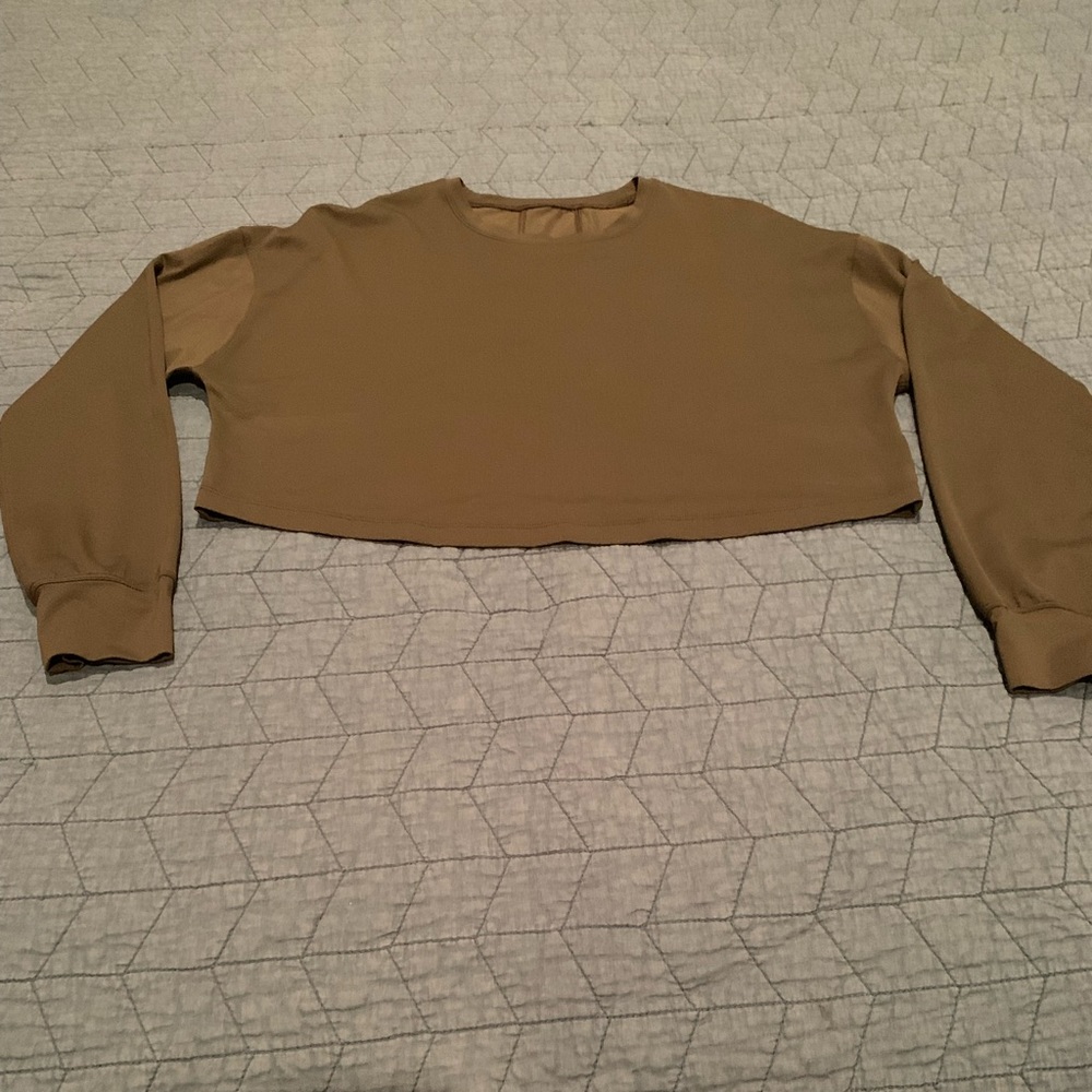 Lulu lemon muscle love long sleeve crop top in olive green. Size 4.
